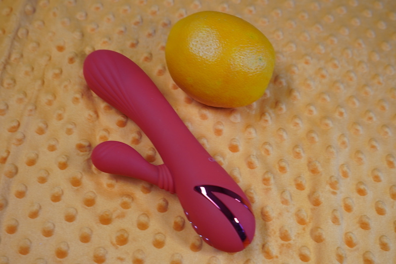The Palades paradise is a sex toy, pictured. It's bright pink with a ribbed head and ribbed arm that waves back-and-forth