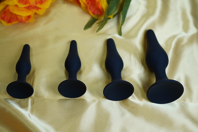 The set of four slim and tall butt plug trainers