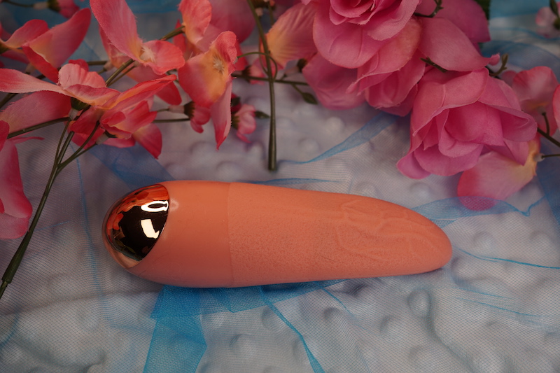 This "g-spot" vibrator is shaped like a realistic tongue and flops back and forth. Keep a good handle on it when you use it. Valentine's Day sex toys. 